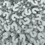 A background of question mark signs and symbols to illustrate le